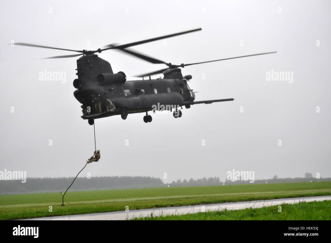 321st Special Tactics Squadron personnel fast rope from an MH-47 ...