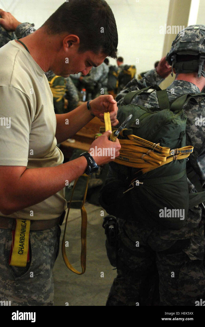A 2nd Brigade Combat Team Jumpmaster insects a Paratrooper's static