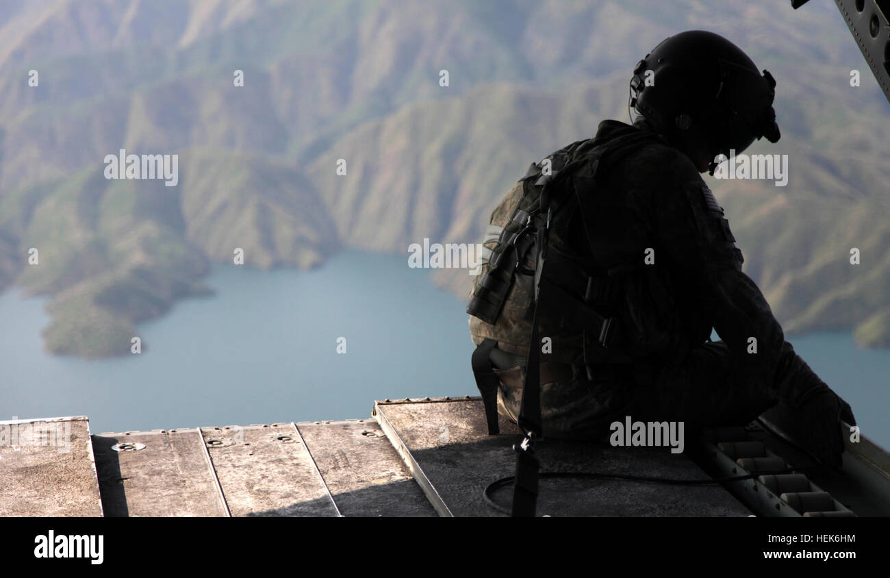 A U.S. Army soldier rides on the ramp of a CH-47 Chinook in Khyber ...