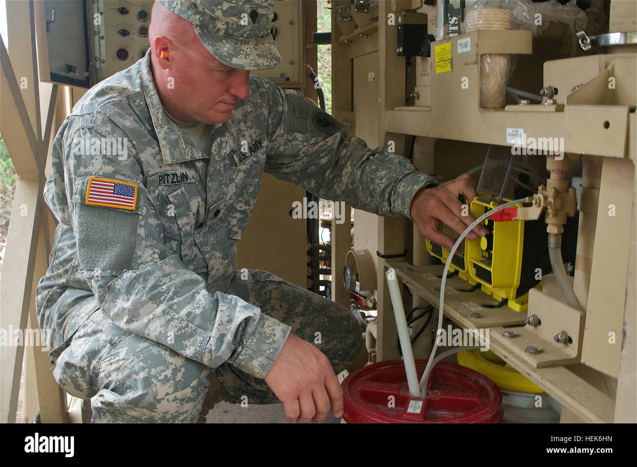 U.S. Army Spc. Joseph Pitzlin, a water treatment specialist, with the