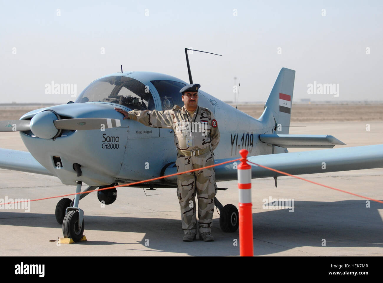 An Iraqi air force pilot shows off a CH2000 reconnaissance plane based at Tallil Air Base.  The 70th Iraqi Squadron was activated on the base Nov. 23 and will continue training and conducting operations to support Operation New Dawn. An Iraqi air force pilot with a CH2000 reconnaissance plane Stock Photo