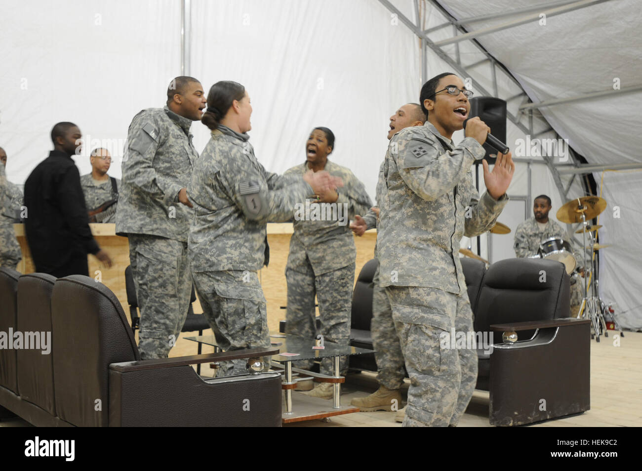 Staff Sgt. Terrence Young, an equal opportunity leader for 404th Aviation Support Battalion, 4th Combat Aviation Brigade, 4th Infantry Division, recites Dr. Martin Luther King Jr.’s “I Have A Dream” speech during a Black History Month event held, Feb. 25, at Camp Marmal. The ceremony was a celebration intended to inspire and educate service members about the history and achievements of black Americans. (U.S. Army photograph by Sgt. Sean Harriman) 4th Combat Aviation Brigade celebrates Black History Month 110225-A--005 Stock Photo