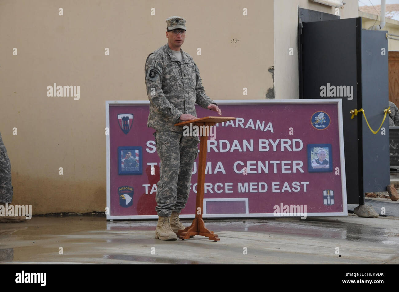 U.S. Army Lt. Col. David Womack, commander of Task Force Red Currahee, 1st Battalion, 506th Infantry Regiment, 4th Brigade Combat Team, 101st Airborne Division, speaks at the opening of the Spc. Jordan Byrd Trauma Center at Forward Operating Base Sharana March 1. The trauma center is named for TF Currahee medic who died in Paktika Province Oct. 13, 2010 while administering life-saving medical treatment to a wounded Soldier while shielding him with his own body from direct fire from insurgents. (Photo by U.S. Army Sgt. Christina Sinders, Task Force Currahee Public Affairs) Trauma center named a Stock Photo