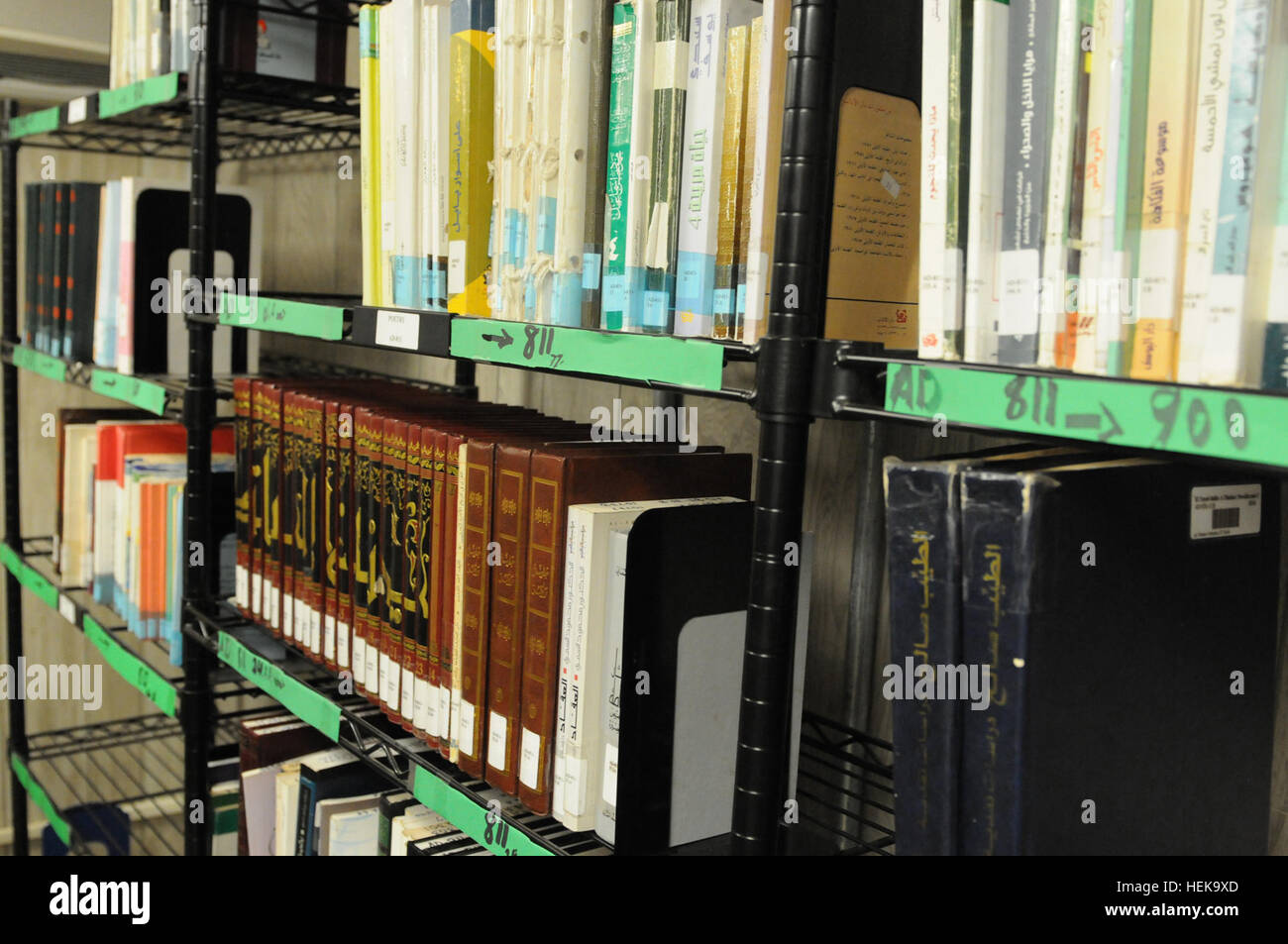 Hundreds of books in several languages line the shelves at the Detainee Library at Naval Station Guantanamo Bay, Cuba, on April 9, 2013. Books, DVDs, games, and magazines are delivered to detention facilities weekly for detainee use. (Photo by Spc. Chalon Hutson.) Hundreds of books in several languages at Detainee Library 130409-A-TE537-006 Stock Photo