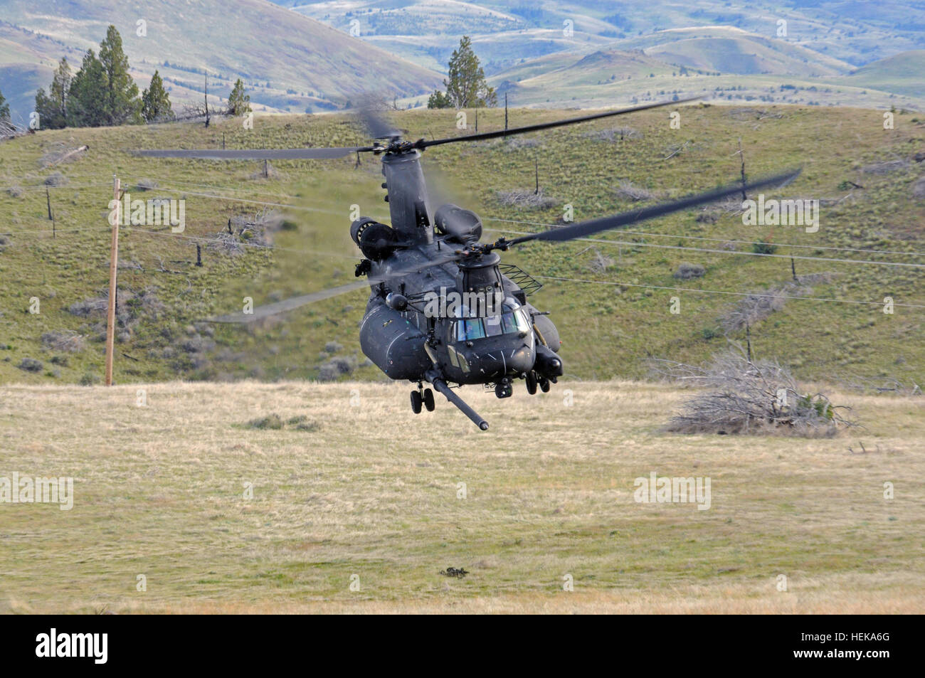 A 160th SOAR MH-47 Chinook conducts a lift-off during joint fast rope ...