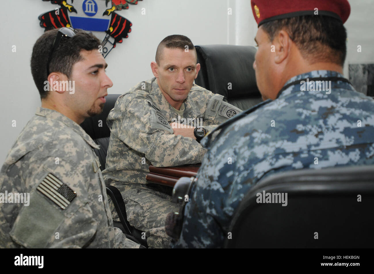 Lt. Col. Chuck Masaracchia, commander of 1st Battalion, 325th Airborne Infantry Regiment, 2nd Advise and Assist Brigade, held a meeting at Red Falcon headquarters, Camp Ramadi, Iraq, with Brig. Gen. Hamid Malik Jarad, Iraqi Police commander of the Abu Risha Brigade, July 9. This was the first meeting between the commanders, who spent the afternoon discussing topics ranging from U.S. and Iraqi partnerships to their favorite sports. Translating the conversation was Saif Waththab Harba, Masaracchia’s interpreter. Jarad commands four IP battalions, covering areas from Ramadi to Fallujah. (U.S. Arm Stock Photo