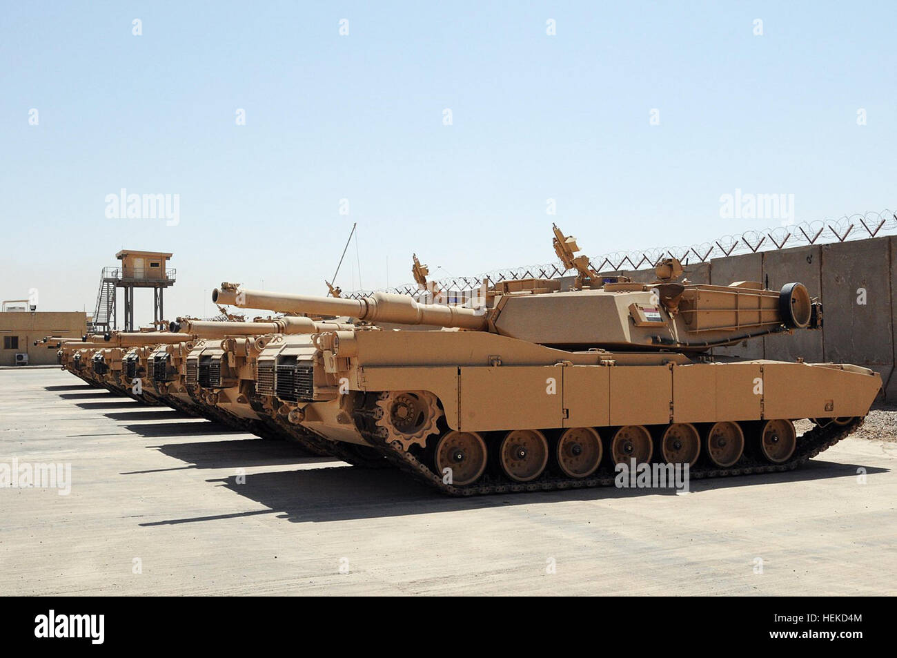 M1A1 Abrams tanks sit parked at a secured compound at the Besmaya Combat Training Center. The last shipment of M1A1 Abrams tanks arrived mid-August completing the Government of Iraq’s purchase of 140 tanks through a Foreign Military Sales agreement with the United States. Newly arrived M1A1 Abrams tanks for Iraq Stock Photo