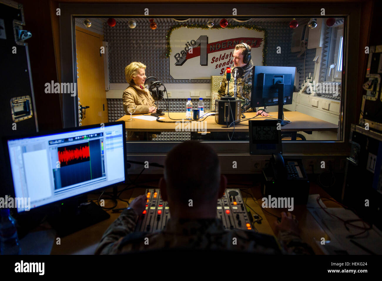 Masar-i-Sharif, Afghanistan. 22nd Dec, 2016. The German Minister of Defence Ursula von der Leyen (CDU, L) is interviewed by Lieutenant Moritz Bock for Radio Andernach, a station of the German Federal Armed Forces, in Camp Marmal in Masar-i-Sharif, Afghanistan, 22 December 2016. Von der Leyen is in the country for the traditional visit of the minister of defence to German troops at Christmas. Photo: Gregor Fischer/Pool/dpa/Alamy Live News Stock Photo