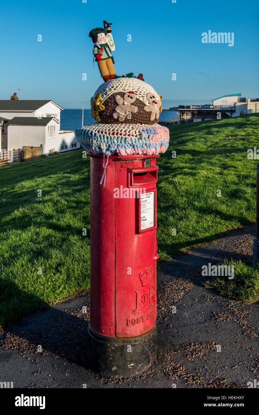 herne Bay, Kent, UK. 22nd Dec, 2016. Many of the post boxes in Herne Bay, such as this one on the seafront, have been topped by knitted characters with a Christmas Theme. The toppers are the work of a local knitting group called the 'Herne Bay Cosy Crew' © Paul Martin/Alamy Live News Stock Photo