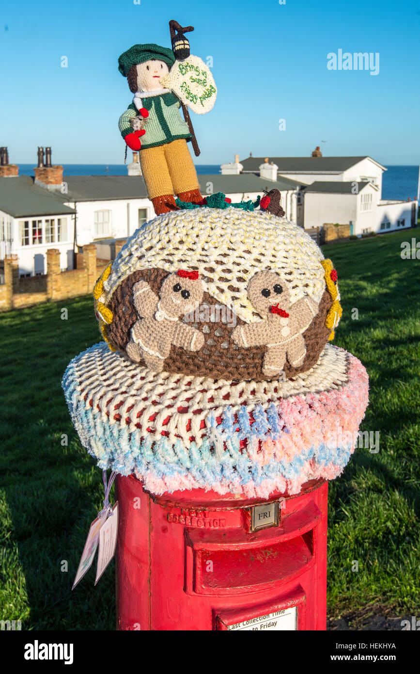 Herne Bay, Kent, UK. 22nd Dec, 2016. Many of the post boxes in Herne Bay, such as this one on the seafront, have been topped by knitted characters with a Christmas Theme. The toppers are the work of a local knitting group called the 'Herne Bay Cosy Crew' © Paul Martin/Alamy Live News Stock Photo