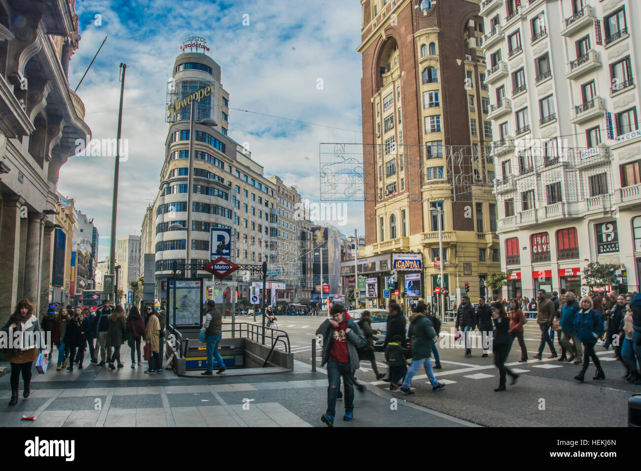 the city council of Madrid decides to reduce two lanes for vehicles in Gran Via avenue, right now it is permit to circulate bicycles, motorbikes, buses, private cars wit zero emissions, taxi residents, and package vehicle companies. The pavement right now is extended through installed fences on the road. Stock Photo