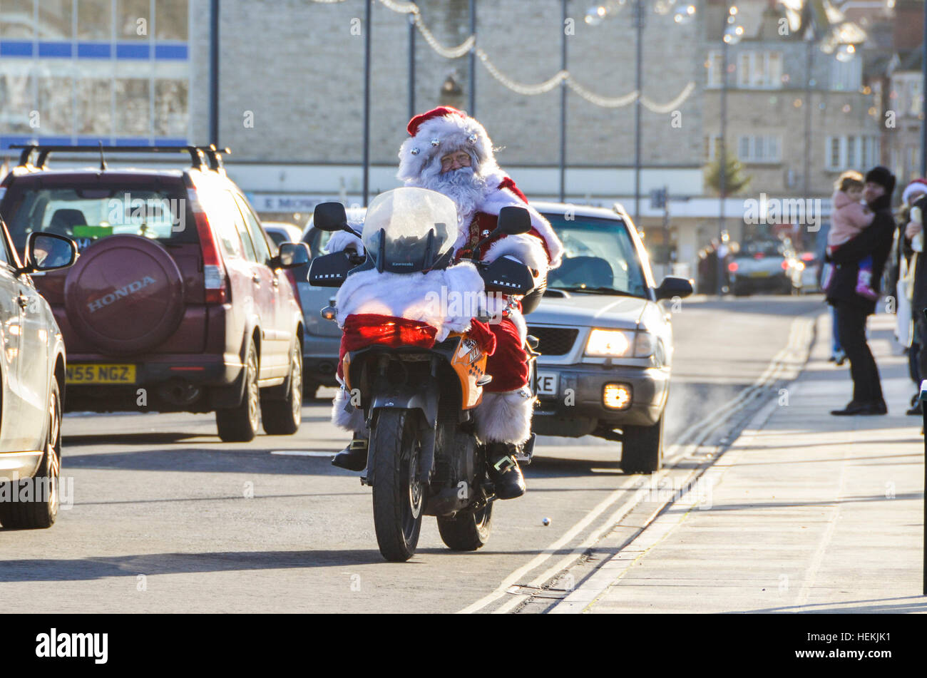 Swanage, Dorset, UK.  22nd December 2016.  A motorbiking Father Christmas visits Swanage on his tour of Dorset.  Father Christmas' location each day can be found on his Facebook page Father Christmas Biker Dorset.  Picture: Graham Hunt/Alamy Live News Stock Photo