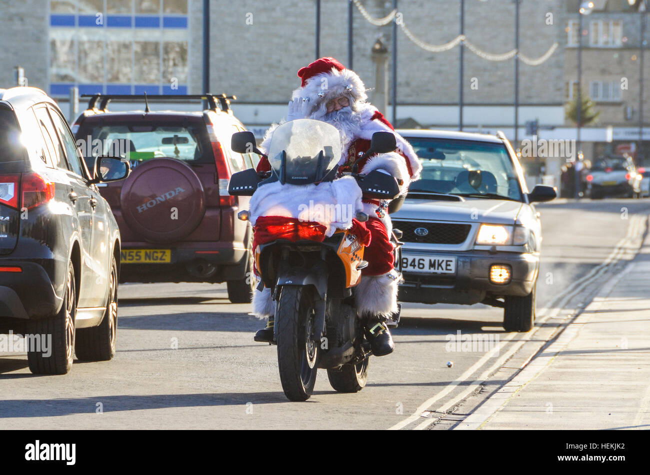 Swanage, Dorset, UK.  22nd December 2016.  A motorbiking Father Christmas visits Swanage on his tour of Dorset.  Father Christmas' location each day can be found on his Facebook page Father Christmas Biker Dorset.  Picture: Graham Hunt/Alamy Live News Stock Photo