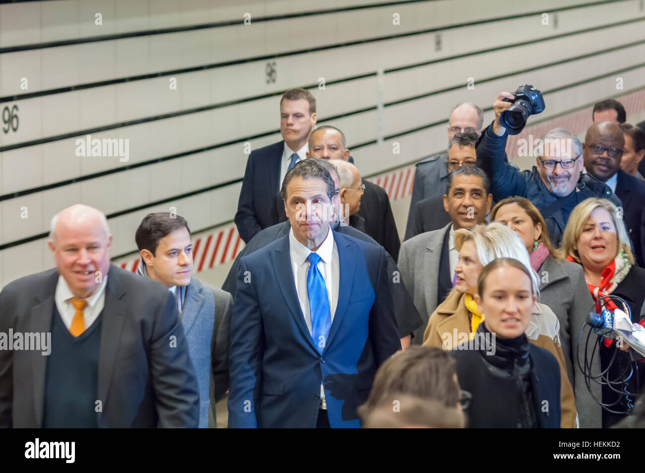 New York, USA. 22nd Dec, 2016. New York State Governor Mario Cuomo, center, visits the 96th Street station on the yet to be opened Second Avenue Subway line for a press conference and tour on Thursday, December 22, 2016. Work on the Second Avenue line started in 1972 but stalled as the economy tanked. It was revived ten years ago and Phase One, traveling up to 96St will open for revenue service on January 1, 2017. © Richard Levine/Alamy Live News Stock Photo