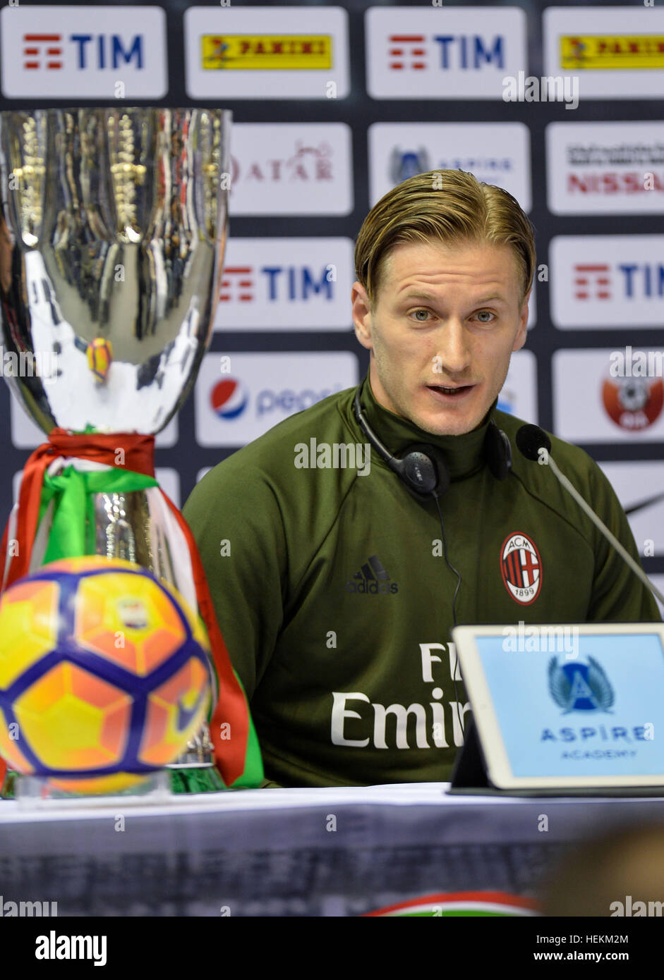 (161223) -- DOHA, Dec. 23, 2016, (Xinhua) -- AC Milan Italian captain and defender Ignazio Abate speaks during a press conference before a training session at Al Sadd stadium in Doha, capital of Qatar, on Dec. 22, 2016. AC Milan will face Juventus in the Italian Super Cup final soccer match at Al Sadd stadium on 23 Dec. 2016. (Xinhua/Nikku) Stock Photo