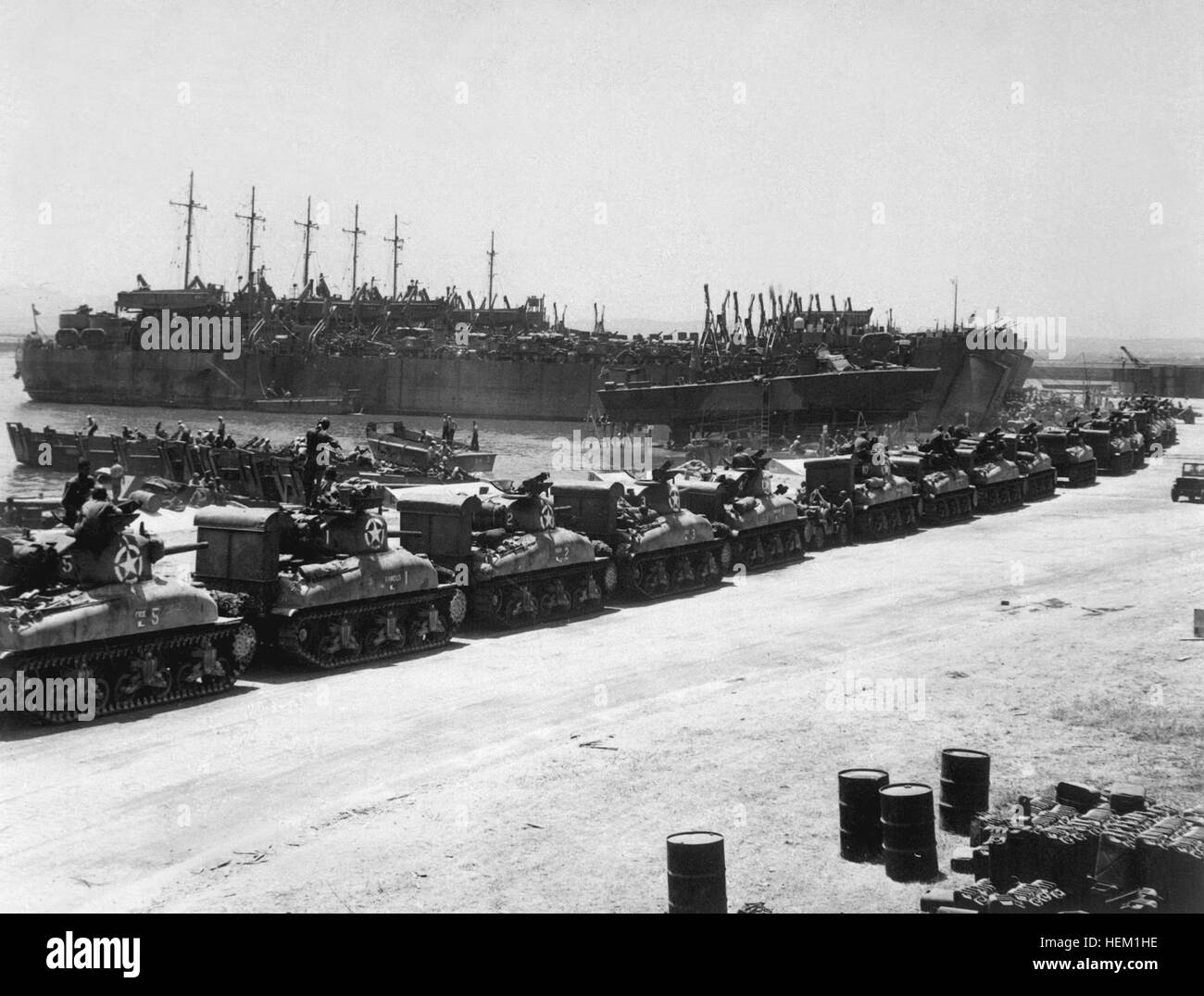 L.S.T.'s lined up and waiting for tanks to come aboard.  Two days before invasion of Sicily.  La Pecherie, French Naval Base. Tunisia, July 1943.  (OSS) Exact Date Shot Unknown NARA FILE #:  226-FPL-2665(A) WAR & CONFLICT BOOK #:  1022 French tunisia lst us tanks 1943 Stock Photo