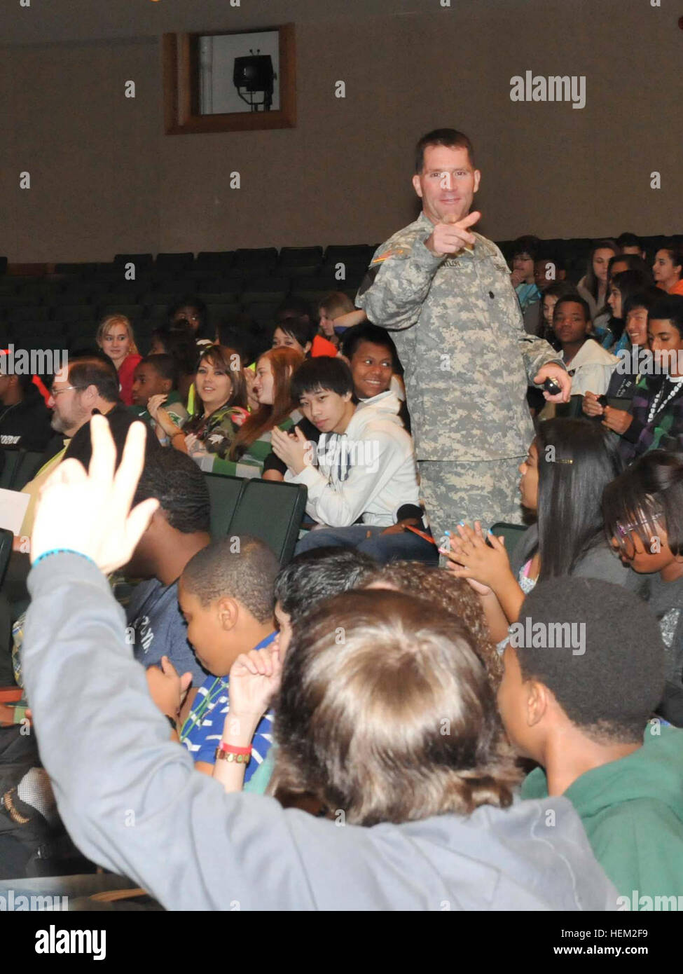 Students were eager to ask questions about the lessons which correlated Buffalo Soldiers and the 9th Cavalry Regiment as well as personal questions to Lt. Col. Cameron Cantlon, the commander for the 6th Squadron, 9th Cavalry Regiment, 3rd Brigade Combat Team, 1st Cavalry Division. This is part of Adopt-a-School program held at Ellison High School, Feb. 8, 2012. Saber Squadron commemorates black history at Ellison High School 120208-A--027 Stock Photo