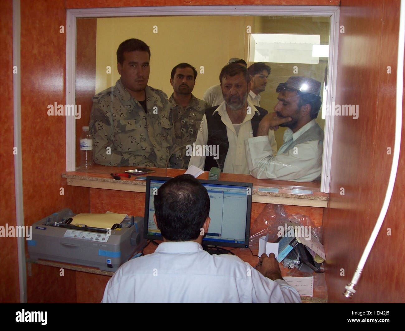 Afghan National Police use the services at the newly opened New Kabul