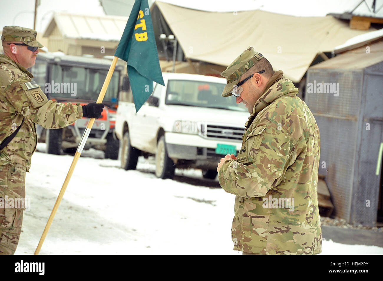 LOGAR PROVINCE, Afghanistan – Lt. Col. Matthew Ingram (right) the 3-1 Special Troops Battalion speaks to his Headquarters and Headquarters Company, prior to awarding combat badges to Soldiers assigned to the company at Forward Operating Base Shank. Ingram, the STB commander, told the troops, “We are making a difference and I hope you all see that, I am proud of every one of you and what you are doing.” (U.S. Army Photo by: Sgt. John D. Ortiz) After facing combat, soldiers receive recognition 528652 Stock Photo