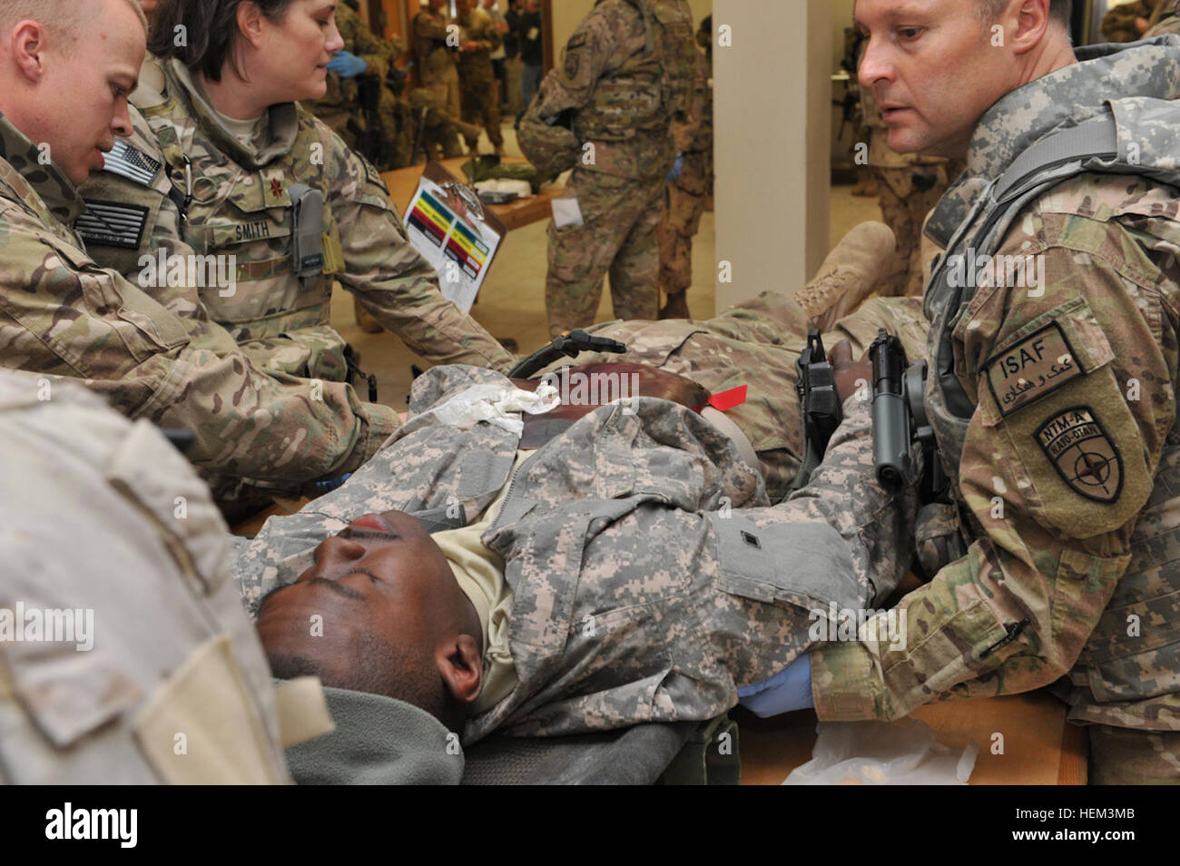 U.S. Forces-Afghanistan MASCAL Teams, along with the Medical Training and Advisory Group made up of U.S. and Canadian medical personnel, serving at New Kabul Compound, in Kabul, Afghanistan, performed a training drill March 16, 2012, to ensure they are prepared in the event of an attack or emergency involving multiple casualties. These scenarios are an important aspect of the MASCAL teams’ training, teaching the team members to work as a cohesive unit resulting in a more effective and efficient response in the event of emergencies, which will save the lives of service members and civilians. MA Stock Photo