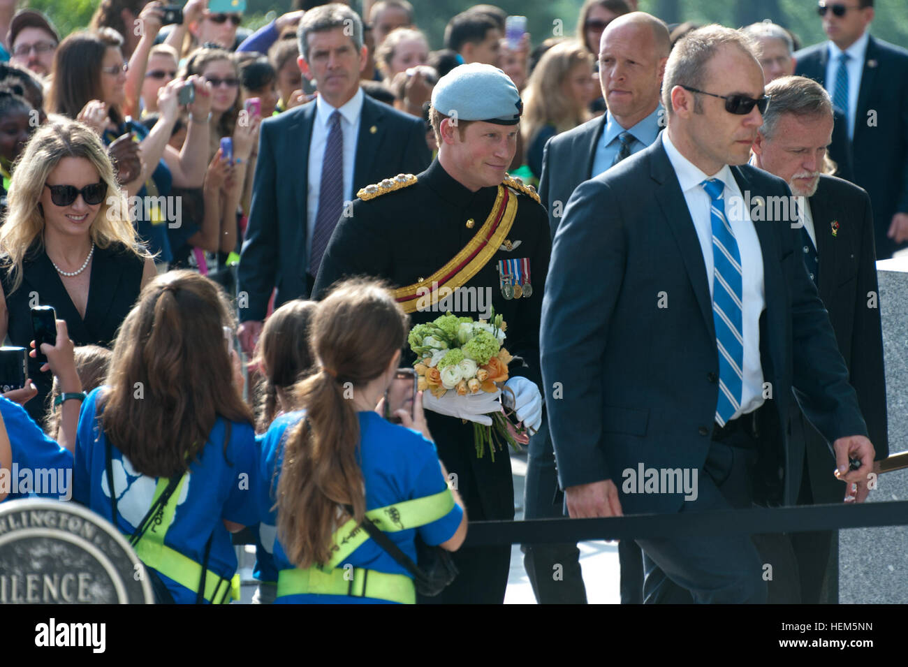 Britain's Prince Harry, center, arrives at President John F. Kennedy's gravesite at the Arlington National Cemetery, Va., May 10, 2013. (U.S. Army photo by Sgt. Laura Buchta/Released) Prince Harry of Wales Arlington visit 130510-A-VS818-179 Stock Photo
