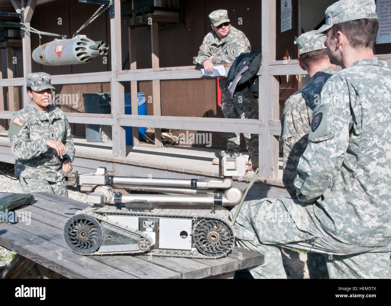 First Lt. Janill Castillo, a native of Bronx, N.Y., supervises training at the EOD detachment on Camp Bondsteel Feb. 25. The 26-year-old is part of few careers that already has females that have been on the front lines of combat. 'Not just an EOD officer' 140225-A-KM241-005 Stock Photo