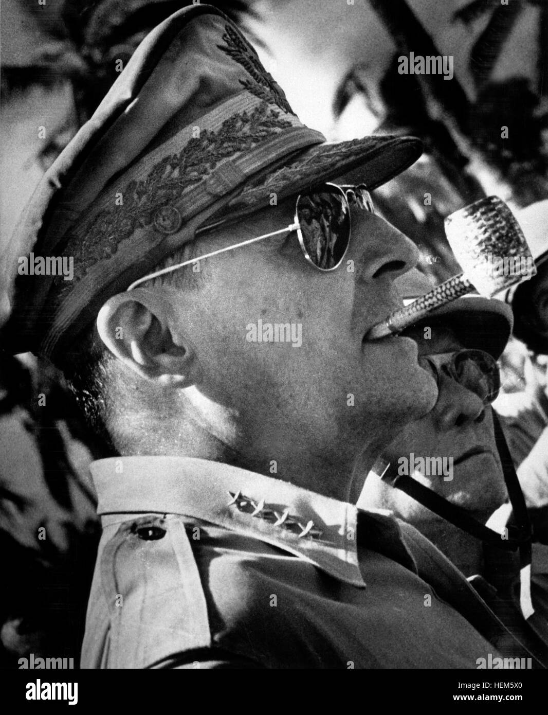 General MacArthur surveys the beachhead on Leyte Island, soon after American forces swept ashore from a gigantic liberation armada into the central Philippines, at the historic moment when the General made good his promise 'I shall return'.  1944. (Coast Guard) Exact Date Shot Unknown NARA FILE #:  026-G-3584 WAR & CONFLICT BOOK #:  744 DouglasMacArthur Stock Photo