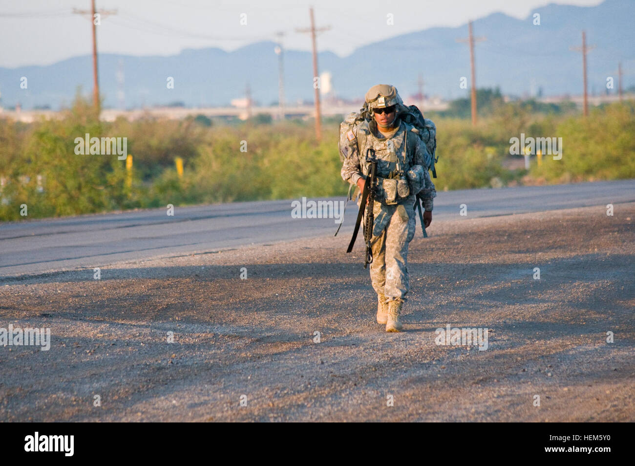 Second Lt. Viola Kelley, a McCormick, S.C., native and executive officer for A Company, 123rd Brigade Support Battalion, trudges through a 12-mile march during the final phase of the Order of the Sustainer Challenge at Fort Bliss, Texas, May 11, 2012. The eight-day challenge consisting of six phases tested each soldier's basic warrior skills, both mentally and physically. 123rd BSB upholds the Order of the Sustainer Challenge 120511-A-VF572-011 Stock Photo