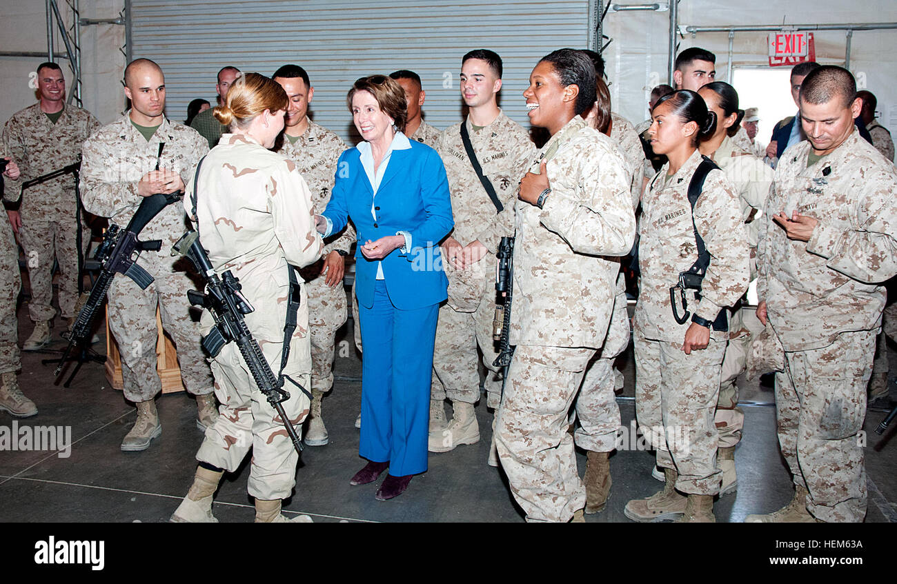 Representative Nancy Pelosi, the minority leader of the United States House of Representatives, visits with servicemembers stationed at Camp Leatherneck, Afghanistan, on Mother's Day May 13. During her speech she thanked the troops for their service and let them know their welfare is a high priority. "I have nine grandchildren, five children; they know to expect that on Mother's Day I am doing what is most important to the well-being of my family and that is to pay my respects to our troops," said Pelosi. Rep. Pelosi visits Camp Leatherneck for Mother's Day 120513-A-SS896-219 Stock Photo