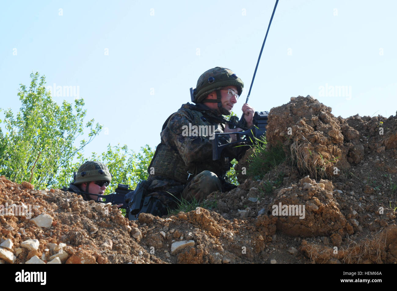 A German soldier reports enemy contact over the radio during an ...
