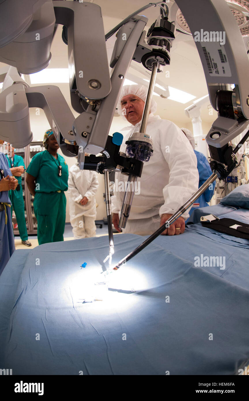 Under Secretary of the Army Joseph W. Westphal inspects the actuating surgical arms of the remote control da Vinci Surgical System, one of the most effective and least invasive surgical treatment options available today at the Fort Belvoir Community Hospital, May 30, 2012, at Fort Belvoir, Va. Westphal visited Fort Belvoir Community Hospital to gain situational awareness and ensure the Army is correctly prioritizing, balancing and integrating resources to support the mission of this vital organization. Fort Belvoir Community Hospital astounds with groundbreaking technology and devotion to pati Stock Photo