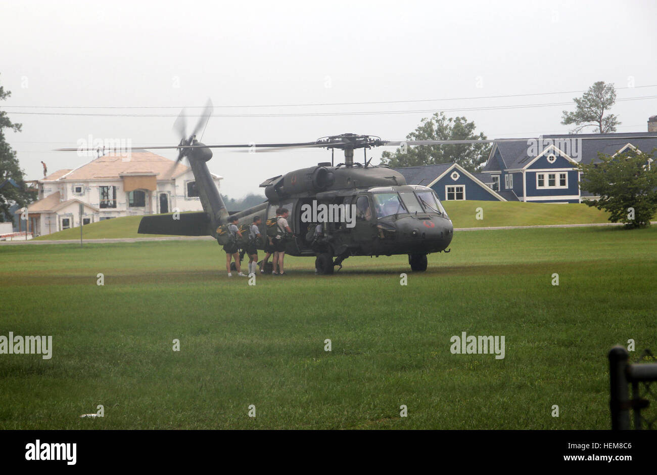 Here, 4th Military Information Support Group (Airborne) Black Hawk UH-60 prior to take off. 4th MISG (A) UH-60 water jump 120725-A-MY599-096 Stock Photo