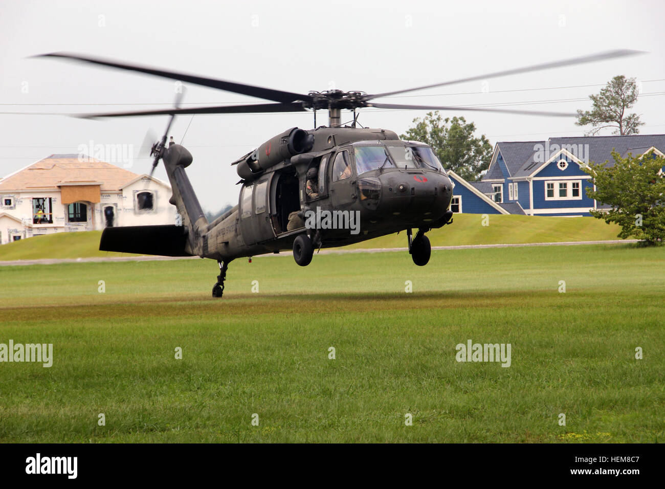 Here, 4th Military Information Support Group (Airborne) UH-60 Black Hawk taking off 4th MISG (A) UH-60 water jump 120725-A-MY599-239 Stock Photo