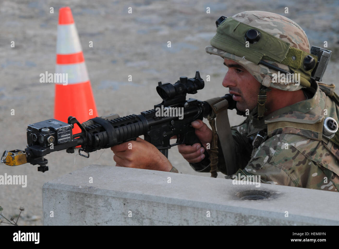 A Georgian soldier, from Bravo Company, 32nd Infantry Battalion, pulls ...