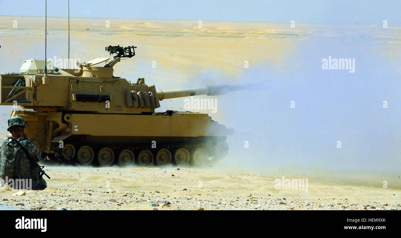 An M109A6 Paladin fires at a target, Sept. 12, at the Udairi Range ...