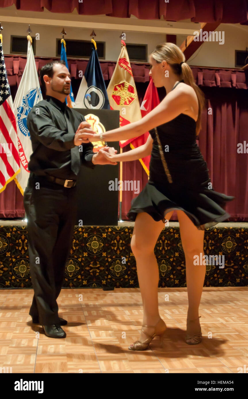 JOINT BASE LEWIS-MCCHORD, Wash.--In honor of tradition, Sean Ragudo and Desiree Grosman, both professionals from the Arthur Murray School of Dance, performed a rumba and salsa during a Hispanic American Heritage Month luncheon on Joint Base Lewis-McChord, Wash., Sept. 18. This year's theme is 'Diversity United, Building America's Future Today' recognizing and celebrating the history, culture and contributions of Hispanic Americans.(U.S. Army photo b Sgt. Sarah E. Enos, 5th Mobile Public Affairs Detachment) JBLM celebrates diversity during Hispanic American Heritage Month 120918-A-FS521-024 Stock Photo