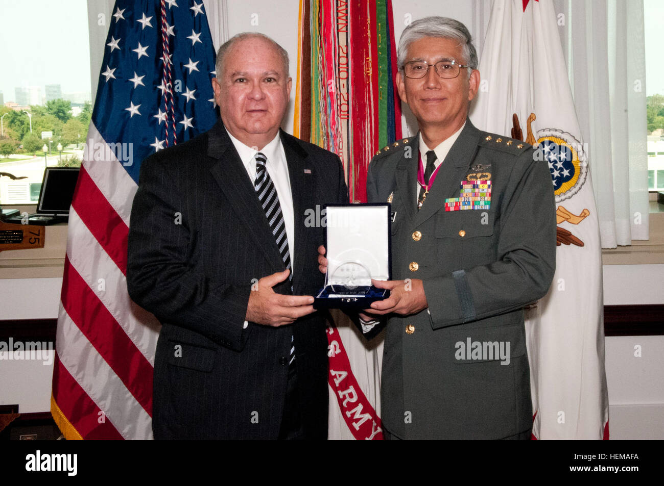 Under Secretary of the U.S. Army Joseph W. Westphal receives a token of