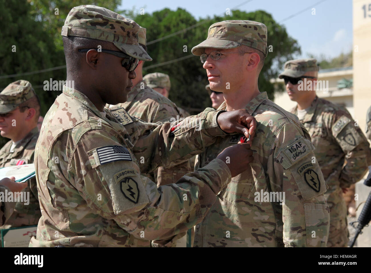 U.S. Army Maj. Mayer with 425th Brigade Special Troops Battalion (Airborne), Task Force 4-25, is awarded the Bronze Star Medal by U.S. Army Lt. Col. Frank Smith, battalion commander for 425th Brigade Special Troops Battalion (Airborne), on Forward Operating Base Salerno, Khost province, Afghanistan, Sept. 29, 2012. Award ceremony 120929-A-PO167-025 Stock Photo