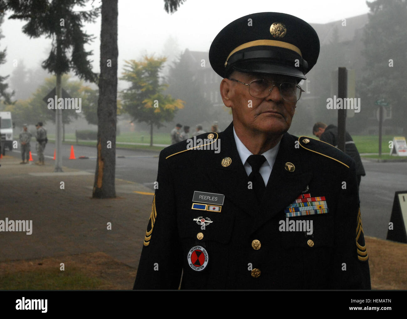 Retired Master Sgt. Gene Peeples, of Largo, Fla., poses for a photo before the reactivation ceremony of the 7th Infantry Division Oct. 10 at Watkins Parade Field, Joint Base Lewis-McChord, Wash. Peeples, who is the president of the 7th Infantry Division Association, served as combat medic with the 7th Medical Battalion, 7th Inf. Div., from 1952 to 1953 and, again, from 1956 to 1957. He served in the Korean War, and helped the medical battalion establish a hospital at Camp Casey, Korea. This is the second time Peeples has seen the division reactivate; the first reactivation ceremony he attended Stock Photo