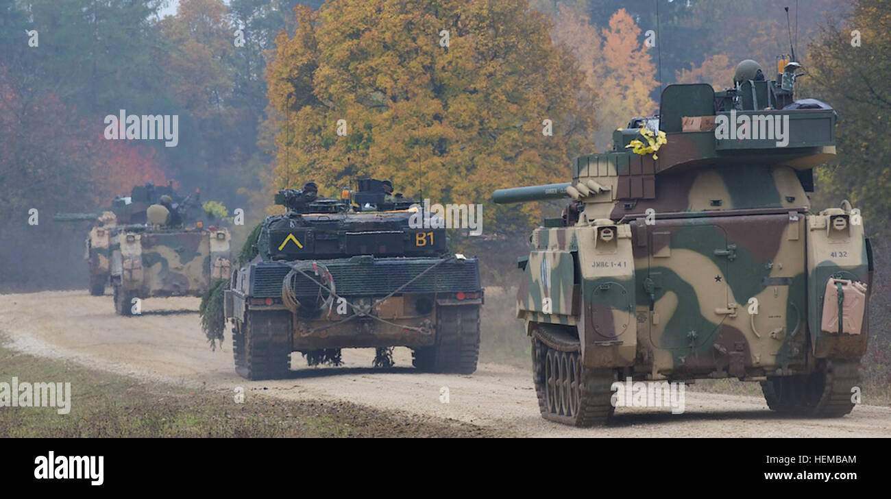 HOHENFELS, Germany - A convoy of tanks from U.S. and German opposing ...