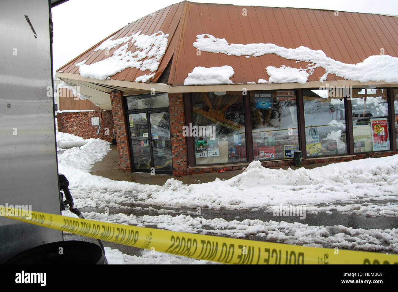 Members of the West Virginia Army National Guard assess a gas station