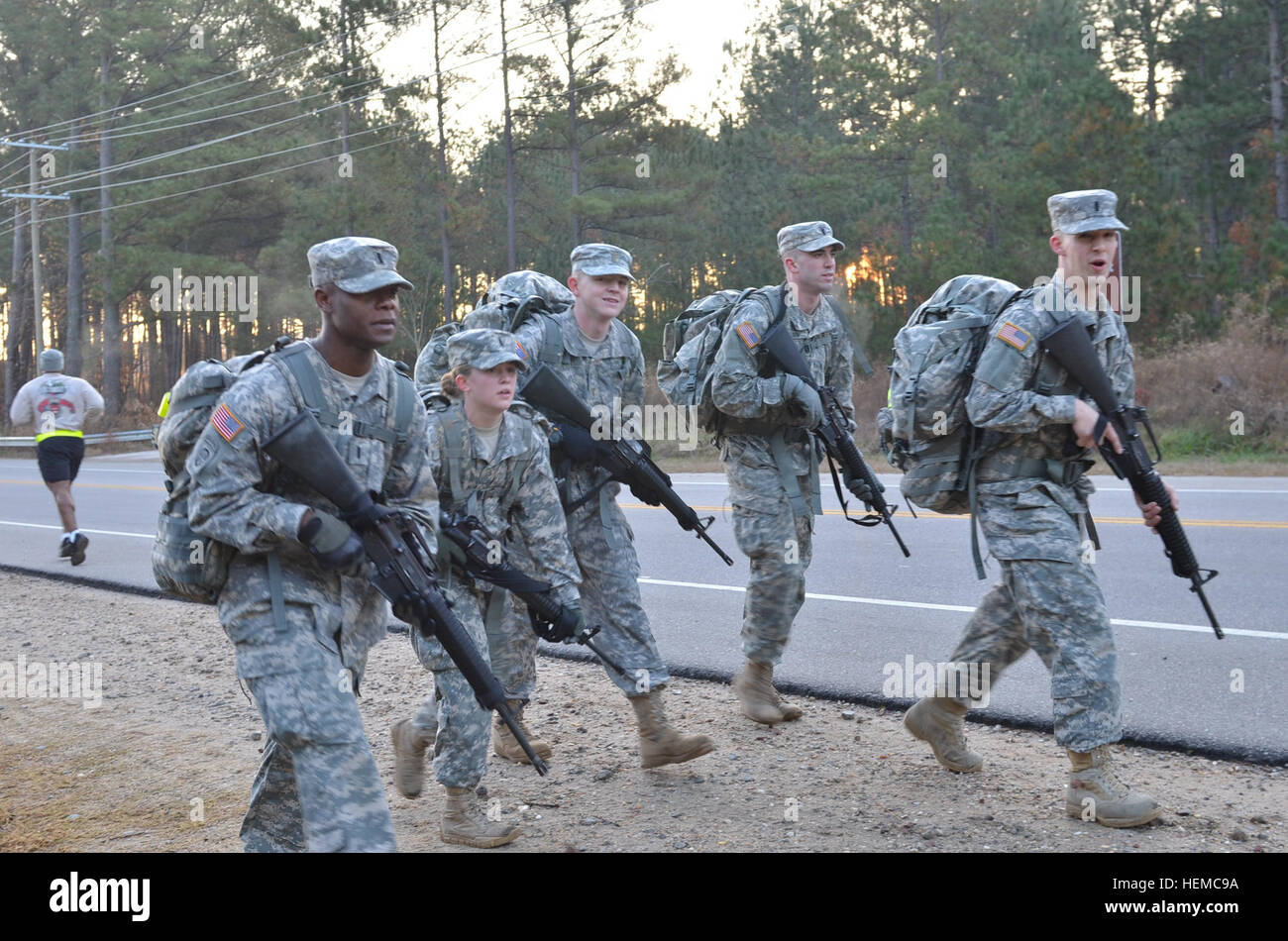 Soldiers from the 16th Military Police Brigade conduct a 10-kilometer ...