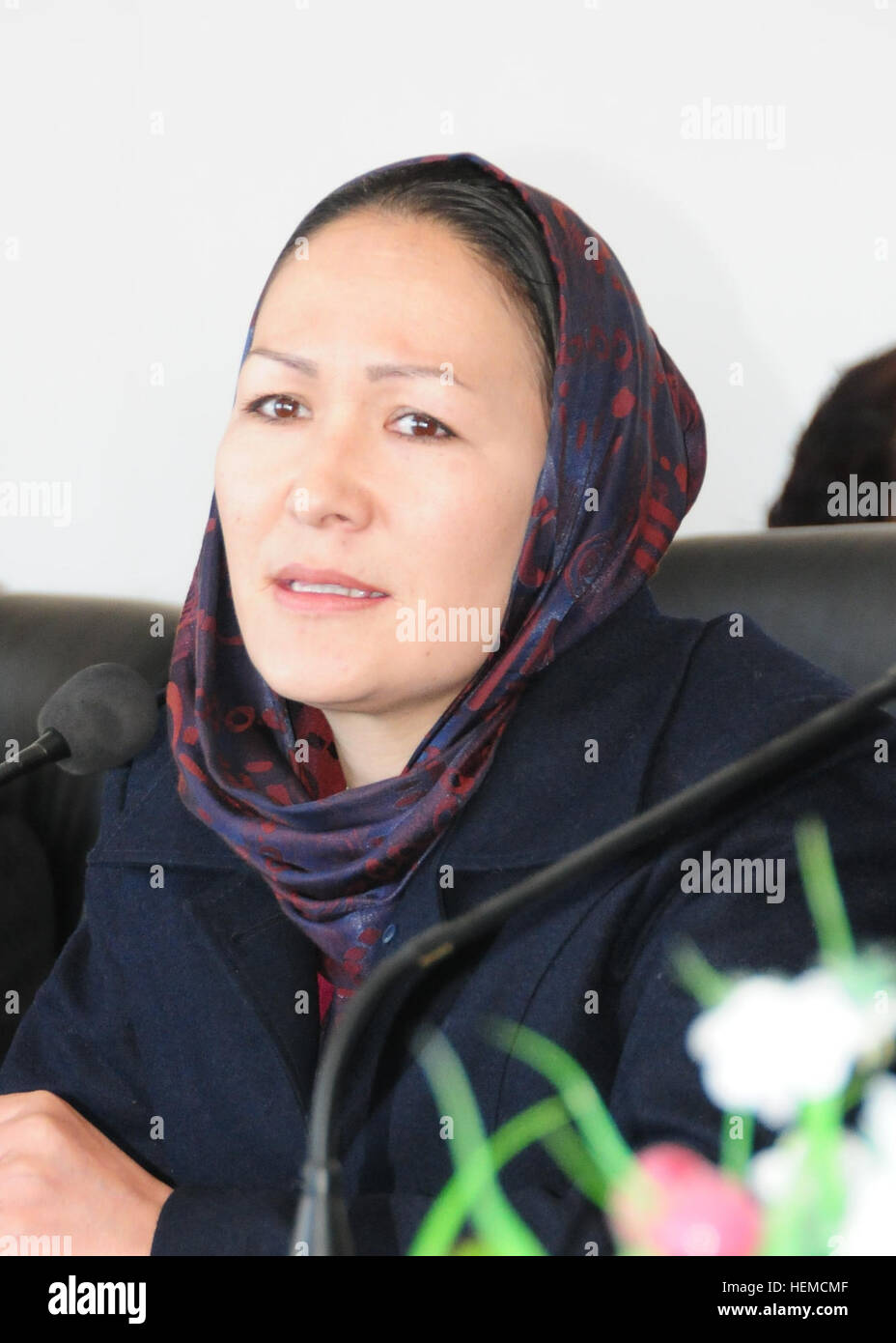 Azra Jafari, Nili Mayor addresses the audience at a shura discussing government assistance projects for females needed throughout the Day Kundi community during a coalition forces assessment visit Dec. 10, 2012 at Nili, Afghanistan. (U.S. Army Photo by Sgt. 1st. Class Theresa Gualdarama) Azra Jafari in 2012-cropped Stock Photo