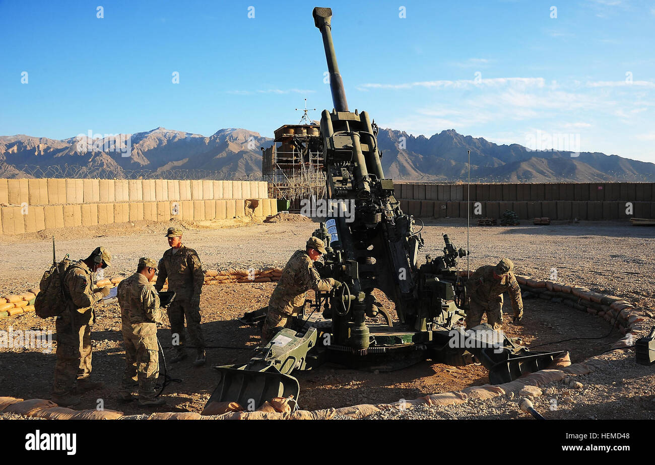 A United States gun crew runs through drills on the M777 Howitzer at