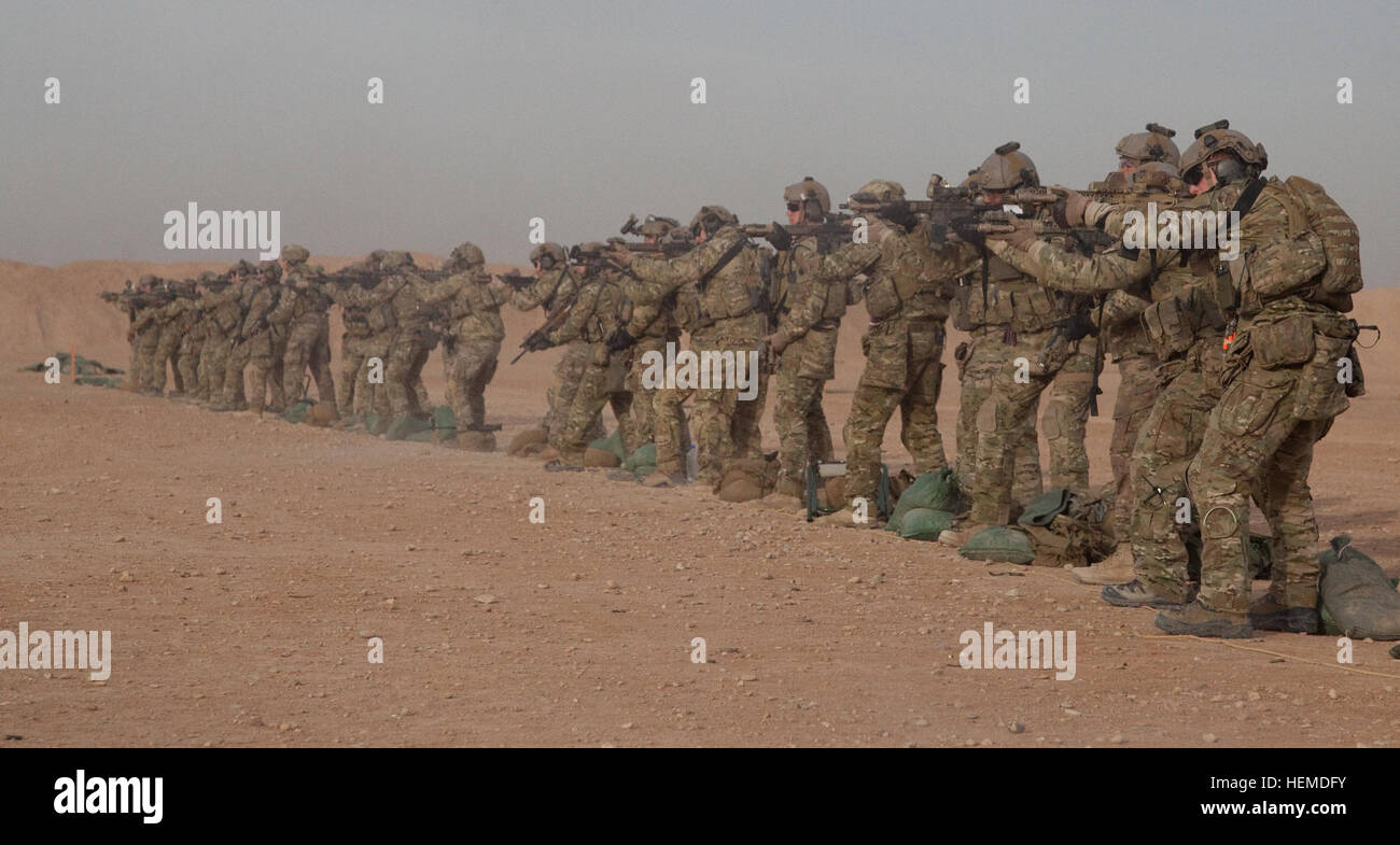 Coalition soldiers participate in advance marksmanship training at a