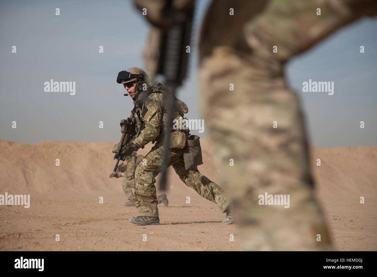 Coalition soldiers participate in advance marksmanship training at a