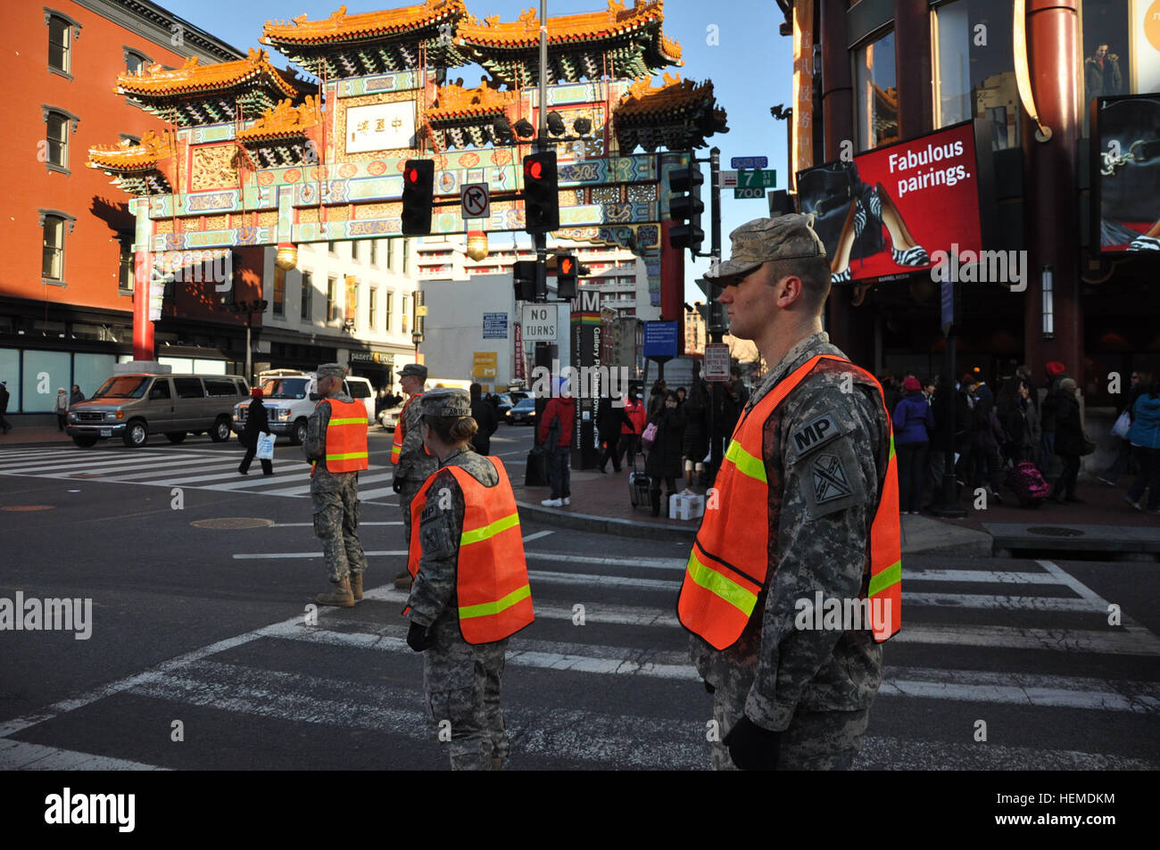 Virginia National Guard soldiers from the Staunton-based Detachment 1 of the 266th MP Company operate traffic control points in Washington, D.C. in support of the Presidential Inauguration Jan. 21, 2013. More than 600 Virginia National Guard soldiers and airmen joined a force of approximately 6,000 National Guard personnel from 25 states and territories supporting the inauguration with traffic control, crowd management, communications and chaplain support. (Photo by Staff Sgt. Terra C. Gatti, Virginia Guard Public Affairs) Virginia MPs assist with inauguration security 130121-A--286 Stock Photo