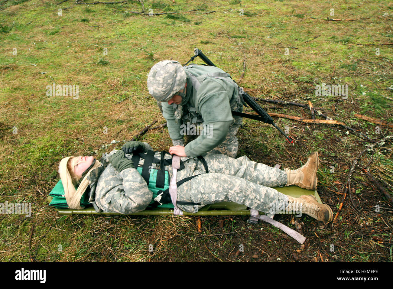 Soldiers from the 575th Medical Company conduct patient extraction and ...