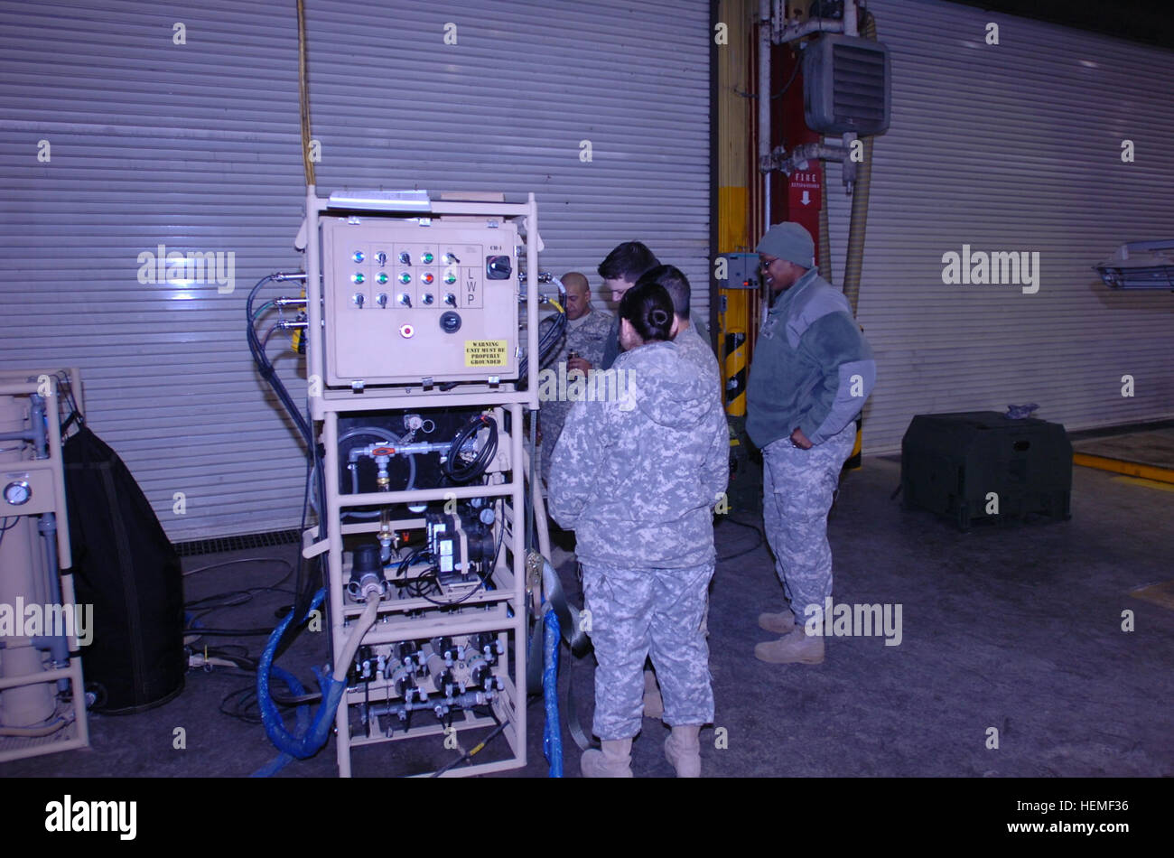 U.S. Soldiers with Alpha Company, 70th Brigade Support Battalion, 210th Fires Brigade, 2nd Infantry Division receive training on newly acquired water purification equipment at Camp Casey in Gyeonggi province, South Korea, Feb. 27, 2013.  (U.S. Army photo by Staff Sgt. Carlos Davis/Released) Alpha Distribution Company conducts new equipment training 130227-A-WV398-015 Stock Photo