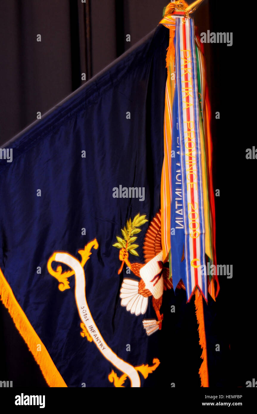 The regimental colors of the 1-501st Infantry, 4th Brigade Combat Team (Airborne), 25th Infantry Division, display their newest Valorous Unit Award streamer for the unit's 2009-2010 deployment to the Paktika province in Afghanistan, March 7, 2013 at the Frontier Theater at Joint Base Elmendorf-Richardson, Alaska. (U.S. Army photo by Staff Sgt. Jeffrey Smith/Released) Storied Parachute Infantry unit receives Valorous Unit Award 130308-A-ZX807-214 Stock Photo